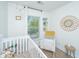Bright Bedroom features a window, chair and crib with decor for a calming environment at 5132 E Liberty Park Cir, North Charleston, SC 29405