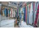 Walk-in closet features custom shelving, ample storage space, and organized layout at 5132 E Liberty Park Cir, North Charleston, SC 29405