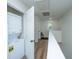 Upstairs hallway area featuring washer and dryer, and views to a window for natural light at 5132 E Liberty Park Cir, North Charleston, SC 29405