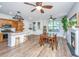 Charming eat-in kitchen features stainless steel appliances, white subway tiles, and a modern island at 5132 E Liberty Park Cir, North Charleston, SC 29405