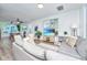 Bright living room features a comfortable sofa, large windows, and stylish decor at 5132 E Liberty Park Cir, North Charleston, SC 29405