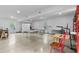 Spacious basement with a smooth concrete floor and recessed lighting offers a versatile area at 516 Central Ave, Summerville, SC 29483