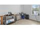 Functional basement area with a sink, storage, and natural light from the window at 516 Central Ave, Summerville, SC 29483