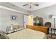 Bedroom with hardwood floors, decorative wall art and lighting, as well as a writing desk at 516 Central Ave, Summerville, SC 29483