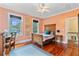 Charming bedroom with an antique bed, wood floors, and natural light at 516 Central Ave, Summerville, SC 29483
