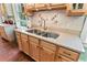 The kitchen sink is a stainless double bowl with modern tile backsplash at 516 Central Ave, Summerville, SC 29483