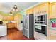 Kitchen featuring stainless steel appliances, light wood cabinetry, and lots of counter space at 516 Central Ave, Summerville, SC 29483