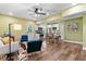 Open-concept living room and kitchen with modern appliances and a comfortable seating area with stylish furnishings at 516 Central Ave, Summerville, SC 29483