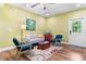 Comfortable living room featuring a ceiling fan, seating, and stylish decor at 516 Central Ave, Summerville, SC 29483