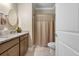 Bathroom featuring granite countertops, decorative mirrors and a tiled shower at 5509 Alpine Dr, Summerville, SC 29483