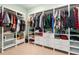 Spacious walk-in closet with custom shelves, drawers, and racks for optimal organization at 5509 Alpine Dr, Summerville, SC 29483