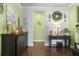 Stylish entryway with wood floors, a dark wood console table, and decorative accents at 5509 Alpine Dr, Summerville, SC 29483