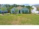 Charming home with a well-maintained lawn, mature trees, and attractive landscaping at 5509 Alpine Dr, Summerville, SC 29483