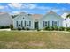 Charming one-story home with an inviting exterior, well-manicured lawn, and beautiful landscaping at 5509 Alpine Dr, Summerville, SC 29483