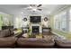 Comfortable living room with a fireplace, hardwood floors, and a cozy atmosphere at 5509 Alpine Dr, Summerville, SC 29483