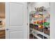 Walk-in pantry with wire shelving and ample storage space, perfect for organizing kitchen essentials at 5509 Alpine Dr, Summerville, SC 29483