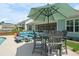 Outdoor patio area featuring dining and lounge seating, perfect for entertaining at 5509 Alpine Dr, Summerville, SC 29483