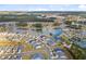The aerial view of a well planned community on a lake shows attractive and diverse homes at 552 Marsh Cv Cir, Summerville, SC 29486