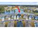 An aerial view of the home featuring a tranquil lake, neighborhood, and nearby pool at 552 Marsh Cv Cir, Summerville, SC 29486