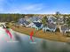 Aerial view of a lakeside home and community, with access to a boat launch and waterfront living at 552 Marsh Cv Cir, Summerville, SC 29486