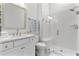 Modern bathroom features marble vanity, glass shower, and stylish fixtures at 552 Marsh Cv Cir, Summerville, SC 29486