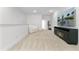 Spacious bonus room with plush carpeting, a cozy sitting area, and a fireplace at 552 Marsh Cv Cir, Summerville, SC 29486