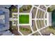 Aerial view of outdoor game area, outdoor theater, and pathways in the community at 552 Marsh Cv Cir, Summerville, SC 29486