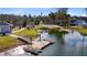 Scenic view of the lake with dock offering easy access for boating and lakeside enjoyment at 552 Marsh Cv Cir, Summerville, SC 29486