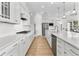 Modern kitchen featuring stainless steel appliances, granite countertops, and ample cabinet space at 552 Marsh Cv Cir, Summerville, SC 29486