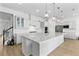 Open concept kitchen with a large center island, stainless steel appliances, and modern cabinetry at 552 Marsh Cv Cir, Summerville, SC 29486