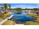 Beautiful lake with docks and a boat ramp, enhancing the community's outdoor appeal at 552 Marsh Cv Cir, Summerville, SC 29486