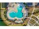 Aerial view of the community pool, surrounded by lounge chairs and lush landscaping at 552 Marsh Cv Cir, Summerville, SC 29486