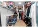 Organized walk-in closet with shelving, hanging racks, and ample storage space at 552 Marsh Cv Cir, Summerville, SC 29486