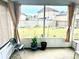 Relaxing screen porch offering views of the backyard and surrounding neighborhood at 565 Mountain Laurel Cir, Goose Creek, SC 29445