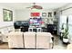 Spacious living room with a ceiling fan, recliner chairs, and an entertainment center at 565 Mountain Laurel Cir, Goose Creek, SC 29445