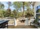 Lovely back deck featuring outdoor dining and a ping pong table, ideal for gatherings and recreation at 639 Bridlewood Ln, Mount Pleasant, SC 29464