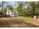 Expansive backyard featuring a pool, manicured lawn, and fencing, offering privacy and space at 639 Bridlewood Ln, Mount Pleasant, SC 29464