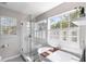 Bright bathroom with a glass shower and soaking tub with a window view at 639 Bridlewood Ln, Mount Pleasant, SC 29464