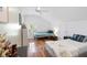 Bedroom featuring two beds with hardwood floors and natural light at 639 Bridlewood Ln, Mount Pleasant, SC 29464