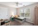 Cozy bedroom with a ceiling fan, carpet, and a large window view at 639 Bridlewood Ln, Mount Pleasant, SC 29464