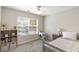 Bedroom with neutral colors, plush carpet, and a small desk under the window at 639 Bridlewood Ln, Mount Pleasant, SC 29464