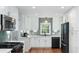 Beautiful kitchen with stainless steel appliances, white cabinetry, and modern finishes at 639 Bridlewood Ln, Mount Pleasant, SC 29464