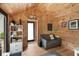 Inviting shed interior with seating area, bookshelf, and natural wood finishes, great for relaxing at 639 Bridlewood Ln, Mount Pleasant, SC 29464