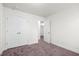 Bedroom with neutral walls and carpet flooring, featuring a closet with lots of storage space at 7787 Montview Rd, North Charleston, SC 29418