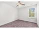 Bright bedroom with natural light, carpet flooring, and neutral walls providing a comfortable space at 7787 Montview Rd, North Charleston, SC 29418
