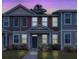 Charming townhome exterior showcasing the well-maintained facade and inviting entrance at 7787 Montview Rd, North Charleston, SC 29418