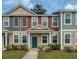Charming townhome exterior showcasing the well-maintained facade and inviting entrance at 7787 Montview Rd, North Charleston, SC 29418
