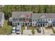 Well-kept townhome exterior features neatly landscaped front yards, covered entrances, and convenient parking at 7787 Montview Rd, North Charleston, SC 29418