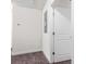 Hallway features carpet and neutral paint at 7787 Montview Rd, North Charleston, SC 29418