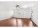 Open-concept living room with hardwood floors and bright, natural light at 7787 Montview Rd, North Charleston, SC 29418
